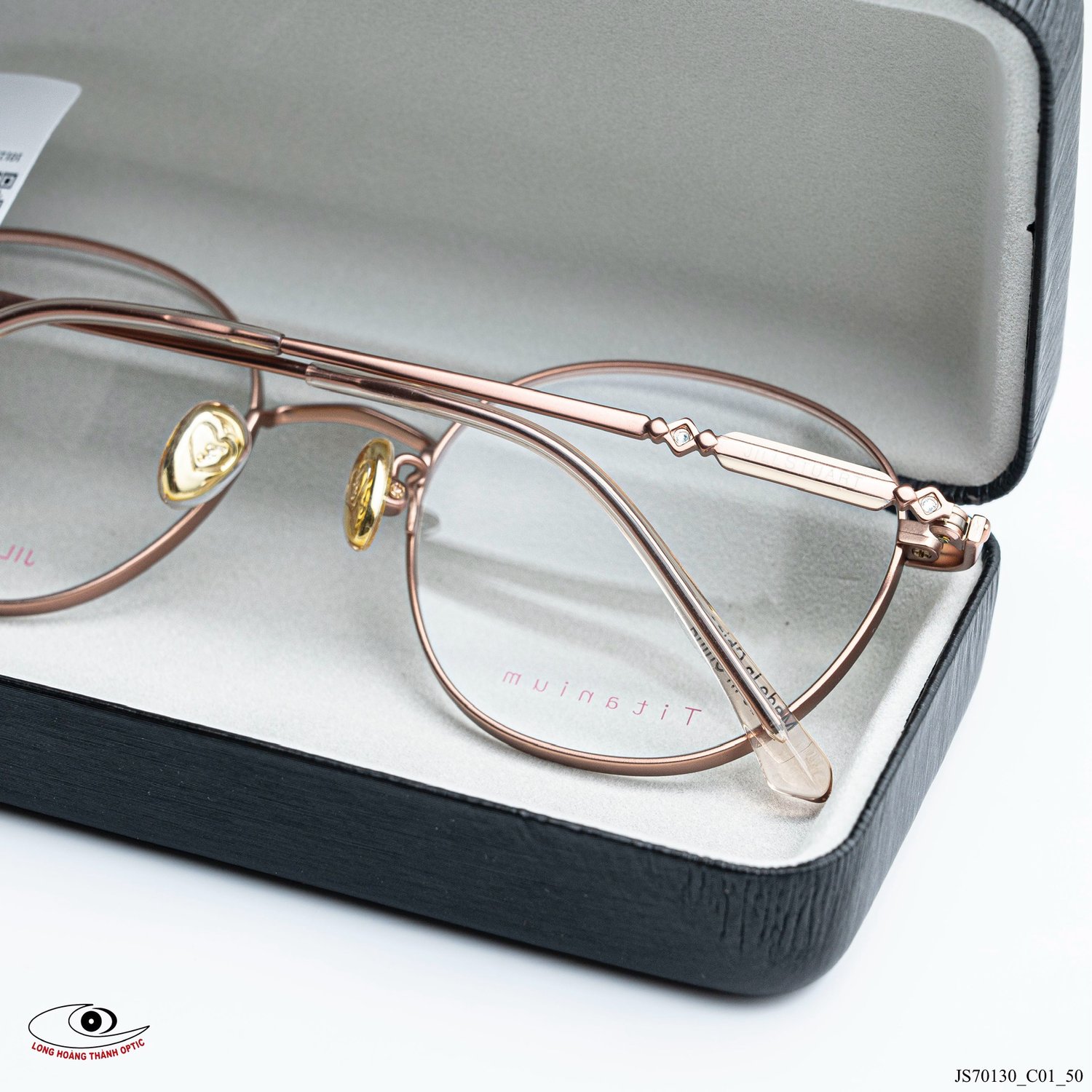 Gọng kính Jill Stuart JS70130-C01 titanium hồng ánh kim dáng tròn cổ điển, siêu nhẹ, tinh tế, phù hợp phong cách nữ tính.