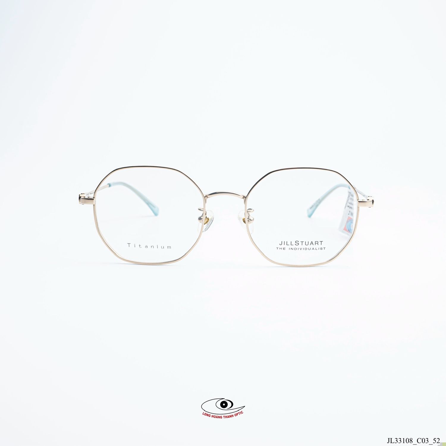 Gọng kính JILL STUART dáng lục giác bằng titanium màu vàng nhạt, thiết kế thanh lịch