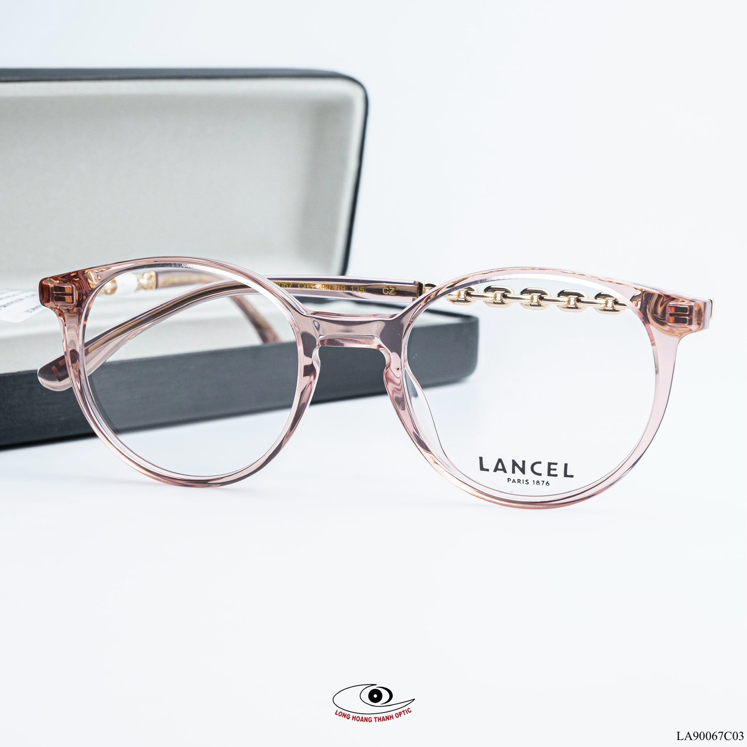 Gọng kính Lancel nữ hồng trong suốt với chi tiết đá quý, tạo điểm nhấn sang trọng cho phong cách hiện đại.