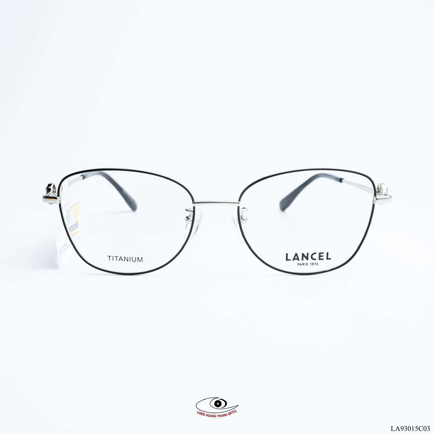 Gọng kính cận nữ Lancel titan màu bạc, kiểu vuông thanh lịch, tôn vinh nét nữ tính hiện đại.